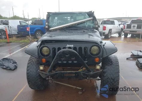 2012 Jeep Wrangler Unlimited Sport from USA, damaged, VIN 1C4BJWDG2CL136763